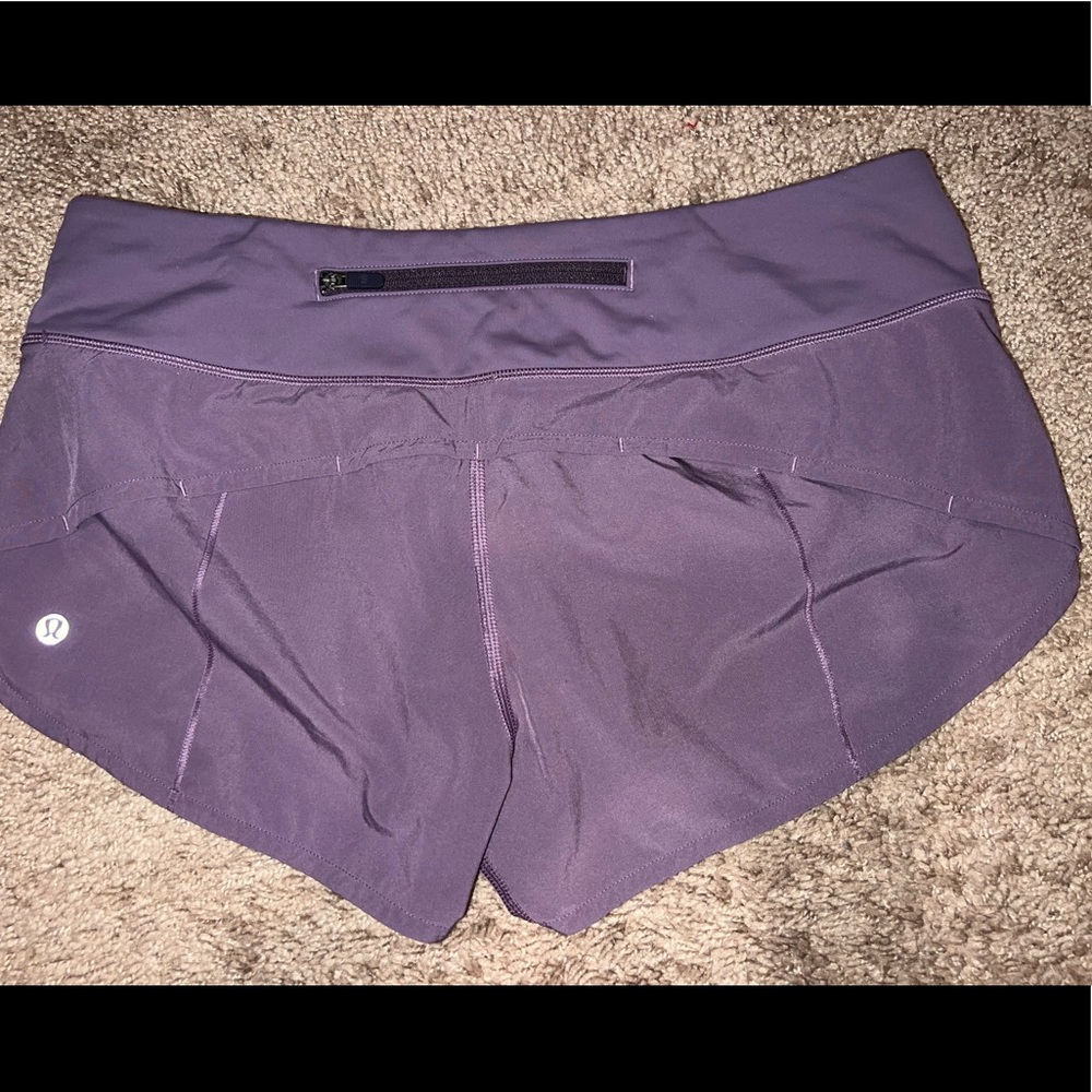 purple lululemon speed up shorts in size 6